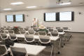 Photograph: [Man Teaching to an Empty Classroom]