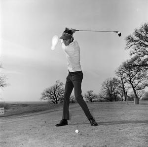 Primary view of [Unknown man golfing]