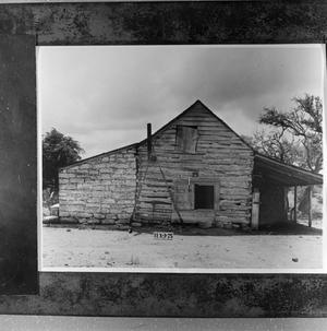 Primary view of [Photograph of a log cabin #3]