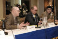 Photograph: [TDNA panelists during conference]