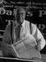 Photograph: [Samuel Wicks holding The Dallas Post Tribune #3]