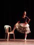 Photograph: [Female dancer with her foot propped on a chair, 2003 World Dance All…