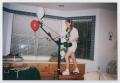 Photograph: [Photograph of a TAMS student on an exercise machine]