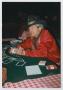 Photograph: [Photograph of a man at a poker table]