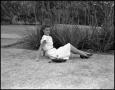 Photograph: [Frances Bazoori on Campus Grounds in White Dress]