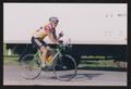 Photograph: [Cyclist Ray Allen passing a U.S mail truck: Lone Star Ride 2002 even…