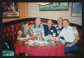 Photograph: [5 people seated around a round booth table: Lone Star Ride 2003 even…