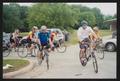 Photograph: [Riders turning a corner as a group: Lone Star Ride 2004 event photo]