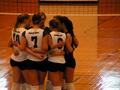 Photograph: [UNT volleyball team huddles during UALR match]