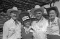 Photograph: [Four people at the Terlingua Chili Cook-Off, 1]