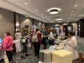 Photograph: [Attendees visiting with the vendors at SSA Houston]