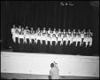 Photograph: [The 1942 All Female Choir Posing on Stage]