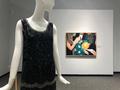 Photograph: [A 1920s beaded dress in front of a Nancy Lamb painting]