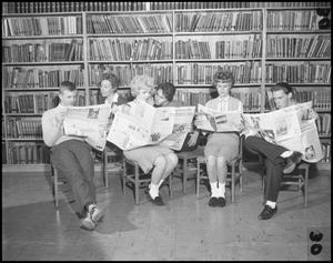 Primary view of object titled '[Students Reading Newspapers Together]'.
