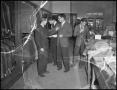 Photograph: [Men Shopping for Suits]