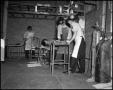 Photograph: [Students welding in a metal shop]
