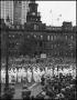 Photograph: [Parade of soldiers standing in front of City Hall]