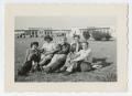 Photograph: [Five Women Sitting in Field]