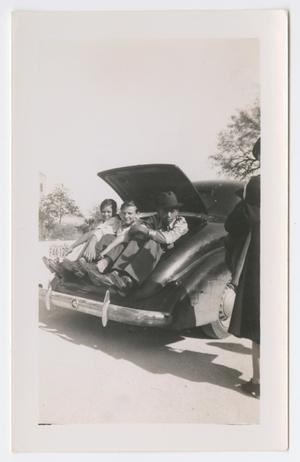 [Students in a Car Trunk]