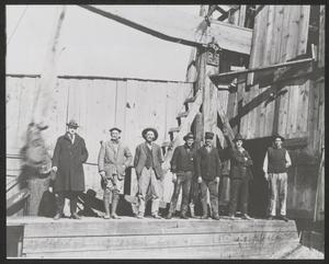 [Men Standing on an Oil Rig]