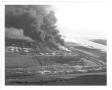 Photograph: [Aerial view of burning storage tanks after the 1947 Texas City Disas…