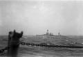 Photograph: [Battleship Viewed Through Stanchion and Lifeline]