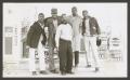 Photograph: [Students in Front of Gas Station]