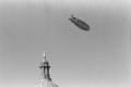 Photograph: [Blimp Flying Over Texas Capitol, Number 2]