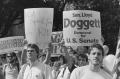 Photograph: [People Holding 1984 Government Official Candidate Signs]