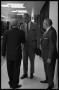 Photograph: [Rhea Howard Guides President Johnson Through Newsroom]