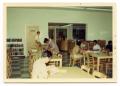 Photograph: [Students in the Library]