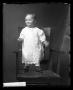 Photograph: [Baby Standing on Chair]