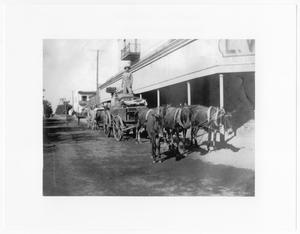 [Wagon in front of store]