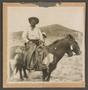 Photograph: [Cowboy and Child on Horses]