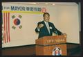 Photograph: [Photograph of Lee Brown Speaking to Houston's Korean American Commun…