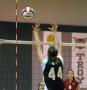 Photograph: [Girl Blocking Volleyball]