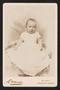 Photograph: [Portrait of an Unknown Baby Sitting on a Blanket]