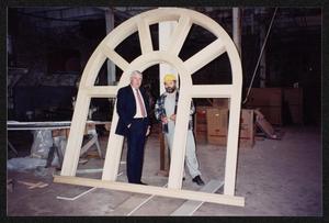 [Wilton Lanning and Joe Cavanaugh Standing in an Arched Window Frame]