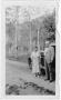 Photograph: [Col. Hugh B. and Helen Moore standing on a road near Santa Fe, New M…