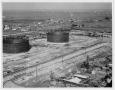 Photograph: [An aerial view of American Oil storage tanks in Texas City in 1934]