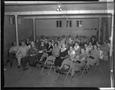Photograph: [Audience at a Meeting]