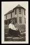 Photograph: [Annie Belle Emery Bright seated in front of Allen house on Heaton Av…