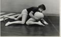 Photograph: Two TCJC Students Wrestling in the Gym