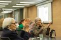 Photograph: [Cathy Hartman and Judith Garrett Segura Applauding at the Portal Two…
