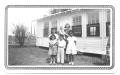 Photograph: [Students Standing in Front of a Sunday School Building]