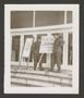 Photograph: [76th AGF Band Members With Signs]