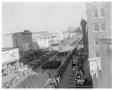 Photograph: [Military groups marching in a parade held in front of the Capitol bu…