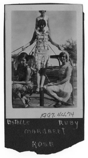 [Photograph of Four Young Women on a Carousel]