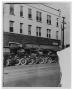Photograph: [Delivery trucks in front of Crystal Cafe]
