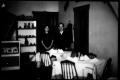 Photograph: [Felix Tijerina and young woman inside a restaurant]